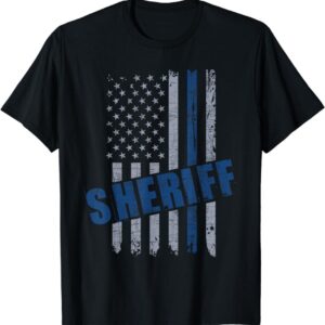 A police officer is wearing an american flag shirt.