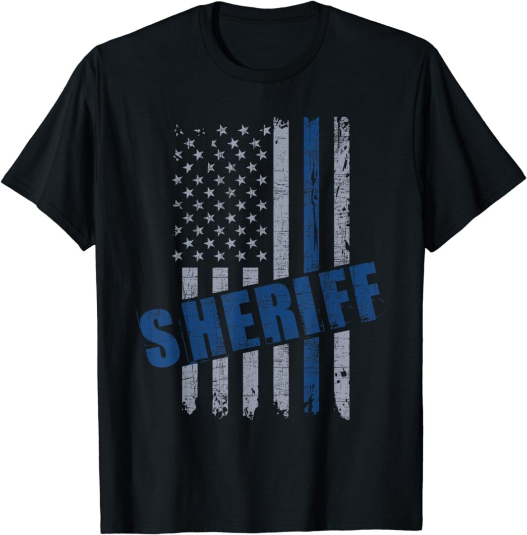 A police officer is wearing an american flag shirt.