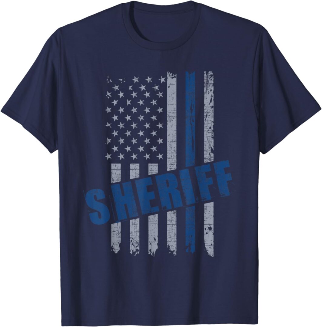 A police officer is wearing an american flag shirt.