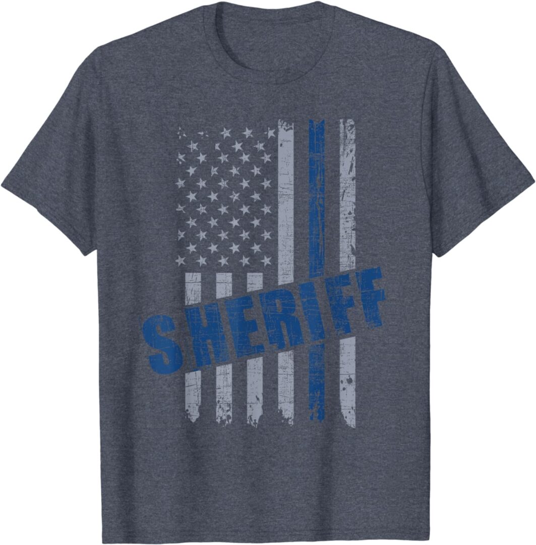 A police officer is wearing an american flag shirt.
